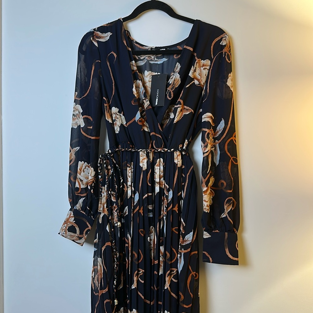 Brunch Date Navy dress from
Fashion Nova